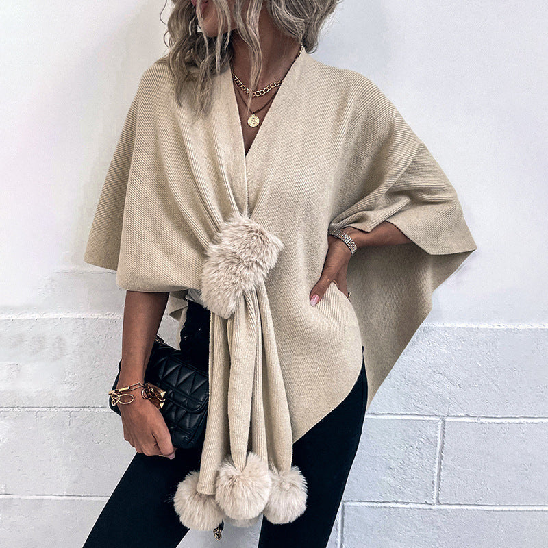 Ladies elegant poncho with luxurious faux fur trim