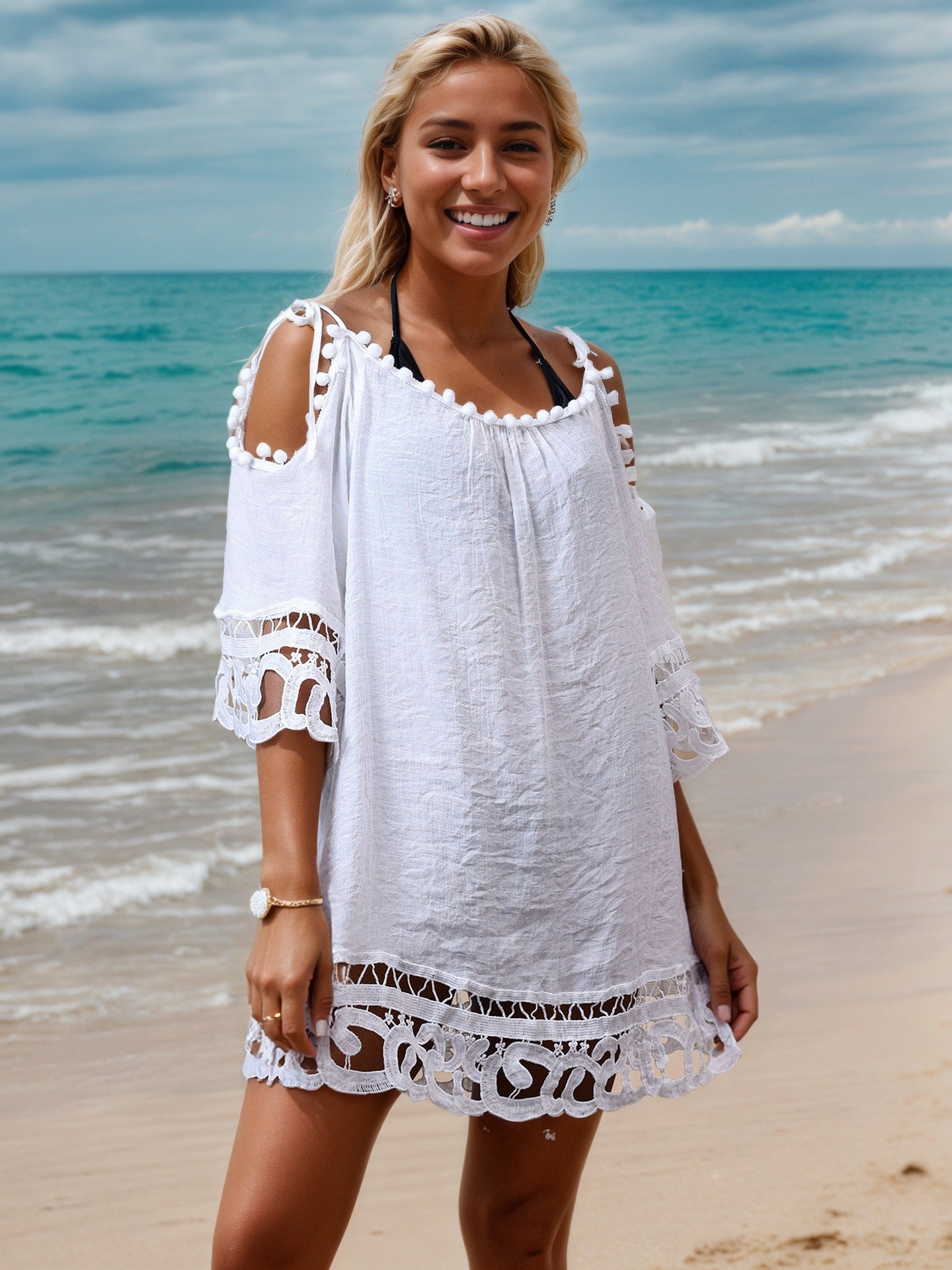 Women’s beach cover-up with lace and tassel details