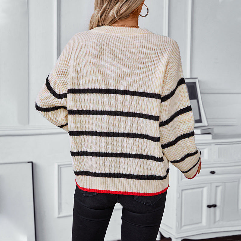 Women's classic knitted pullover with maritime striped pattern and wide cut