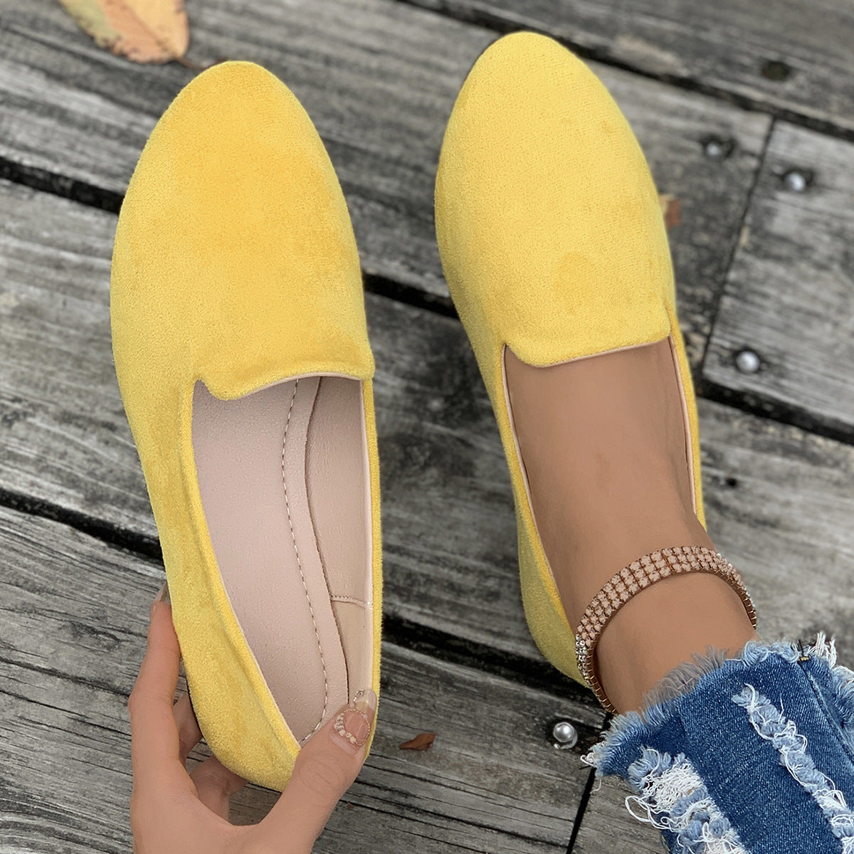 Ladies comfortable slippers in elegant design with soft surface texture
