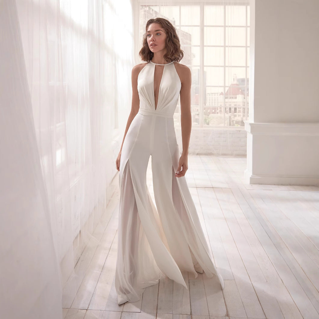 Ladies Elegant Evening Jumpsuit with Deep V-Neck and Flowing Skirt