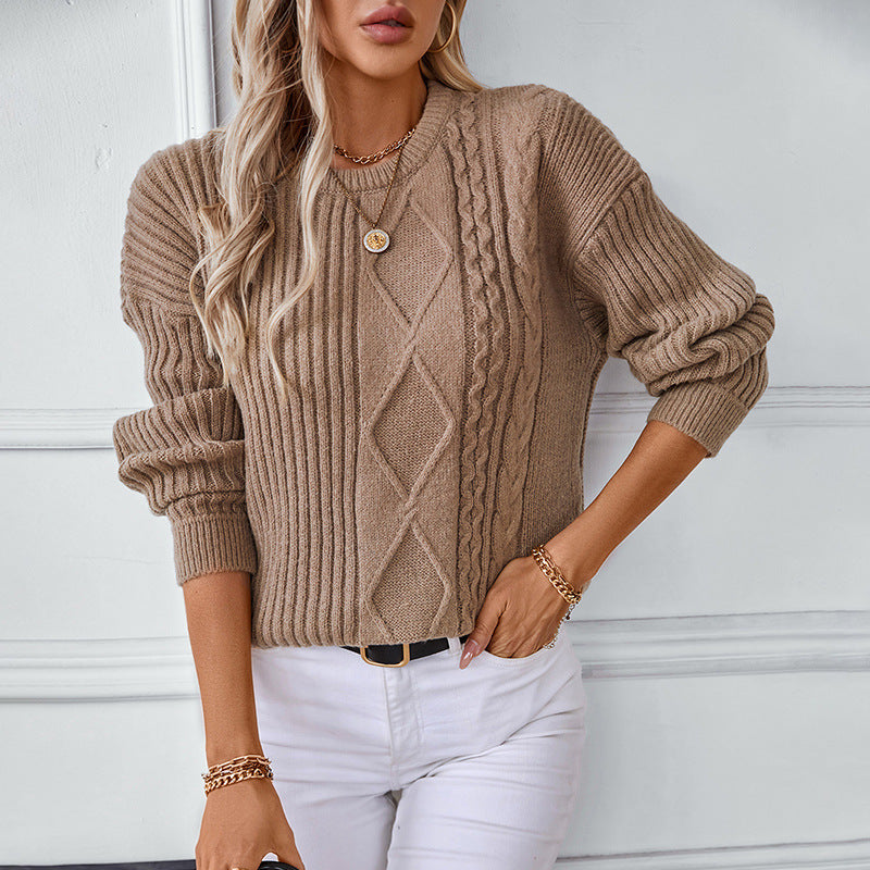 Women's fashionable knitted pullover with structured patterns and round neckline