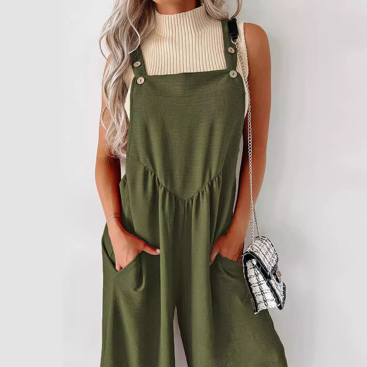 Women’s casual jumpsuit with wide cut legs and decorative button details