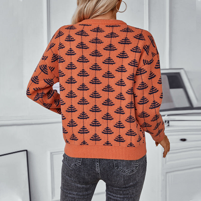 Women's knitted pullover with playful tree design and soft material