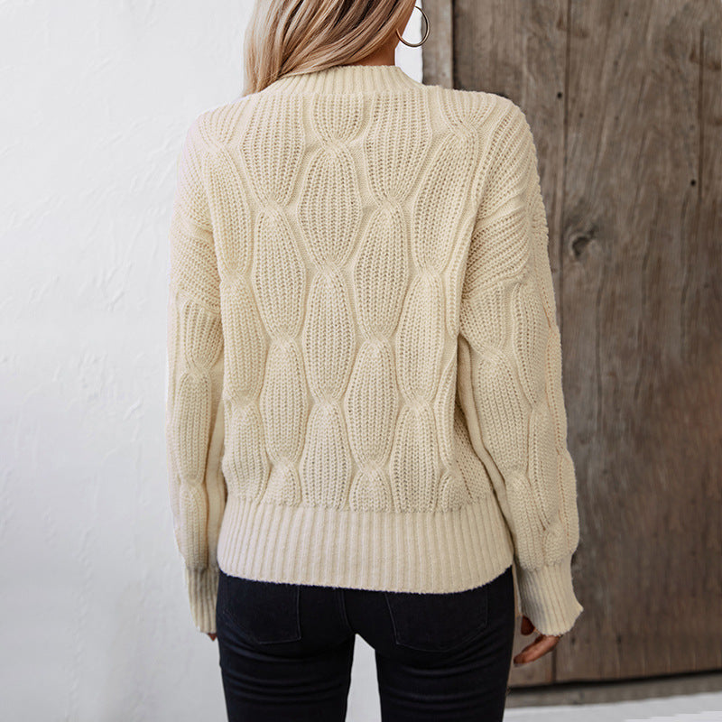 Women’s knit pullover with decorative cable design and comfortable fit