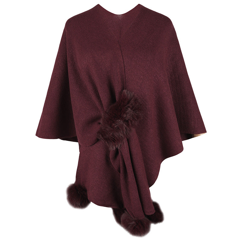 Ladies elegant poncho with luxurious faux fur trim