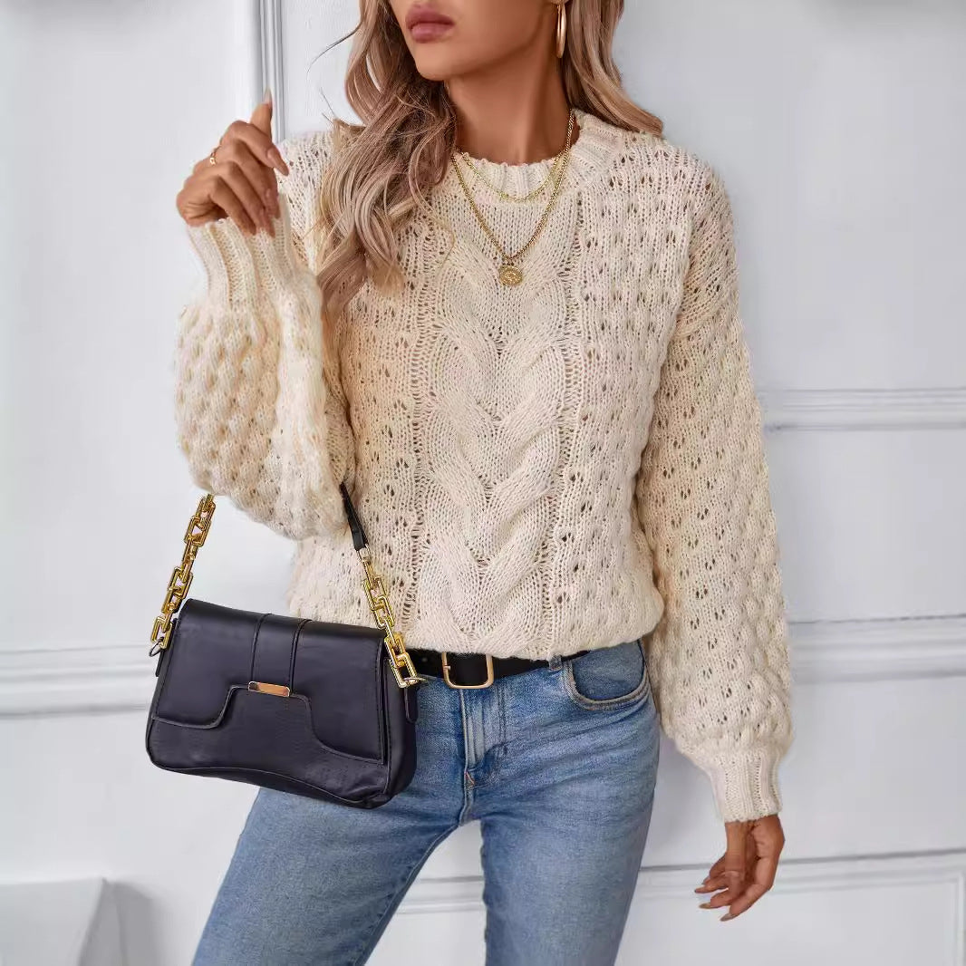 Women's cozy knit pullover with textured cable pattern and casual fit