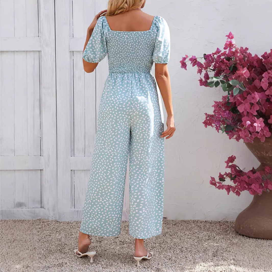 Women's floral patterned jumpsuit with puff sleeves and side pockets