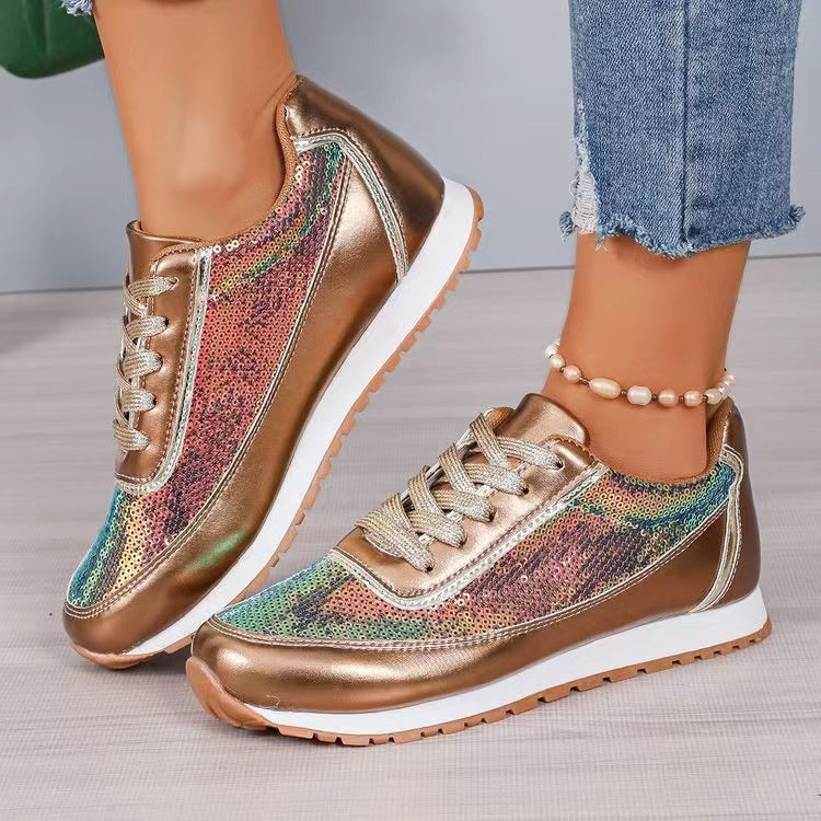 Ladies fashionable sneakers with shimmering upper material and non-slip sole