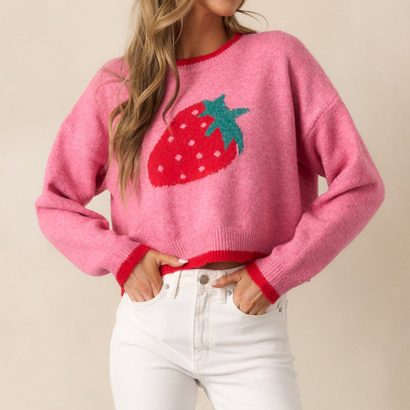 Women’s trendy pullover with strawberry motif and contrast cuffs