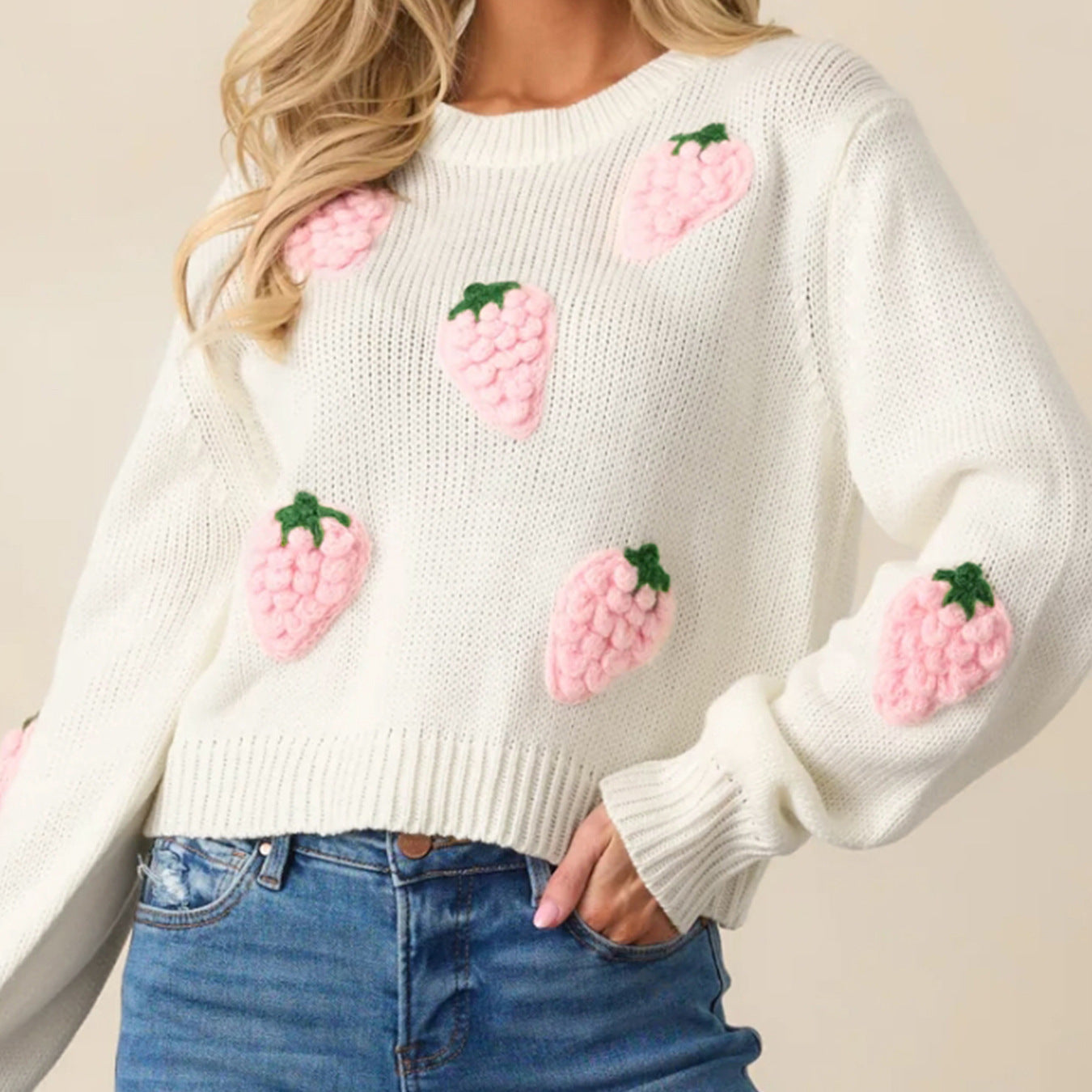 Women's knit pullover with strawberry appliques and casual cut