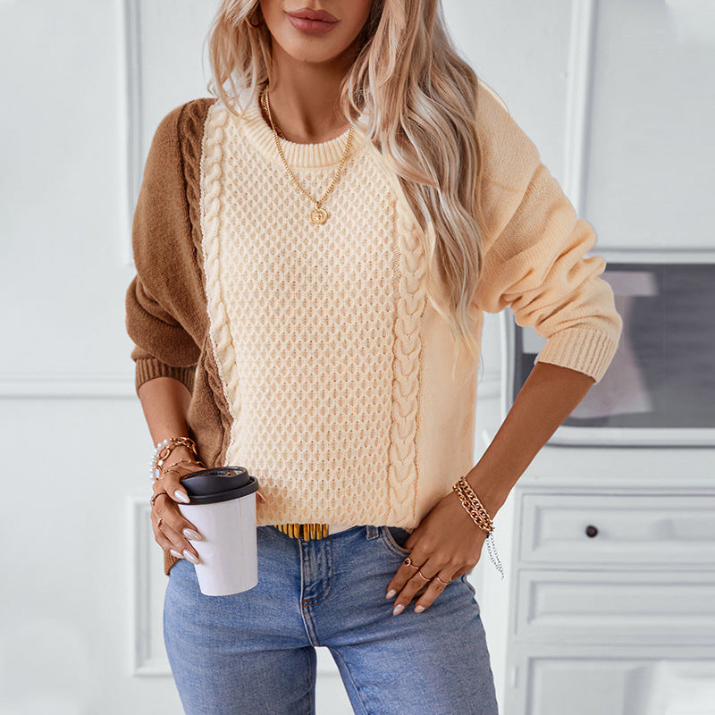 Ladies fashionable pullover with textured cable pattern and innovative color block design