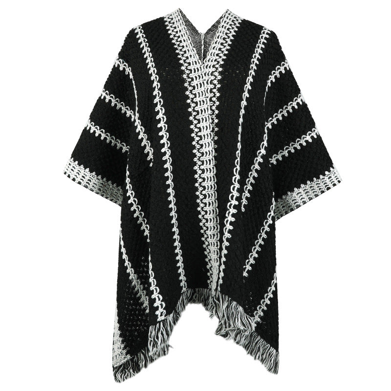 Women's knit poncho with V-neck and fringes