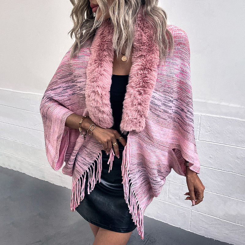 Women elegant poncho with luxurious faux fur collar and fringed hem