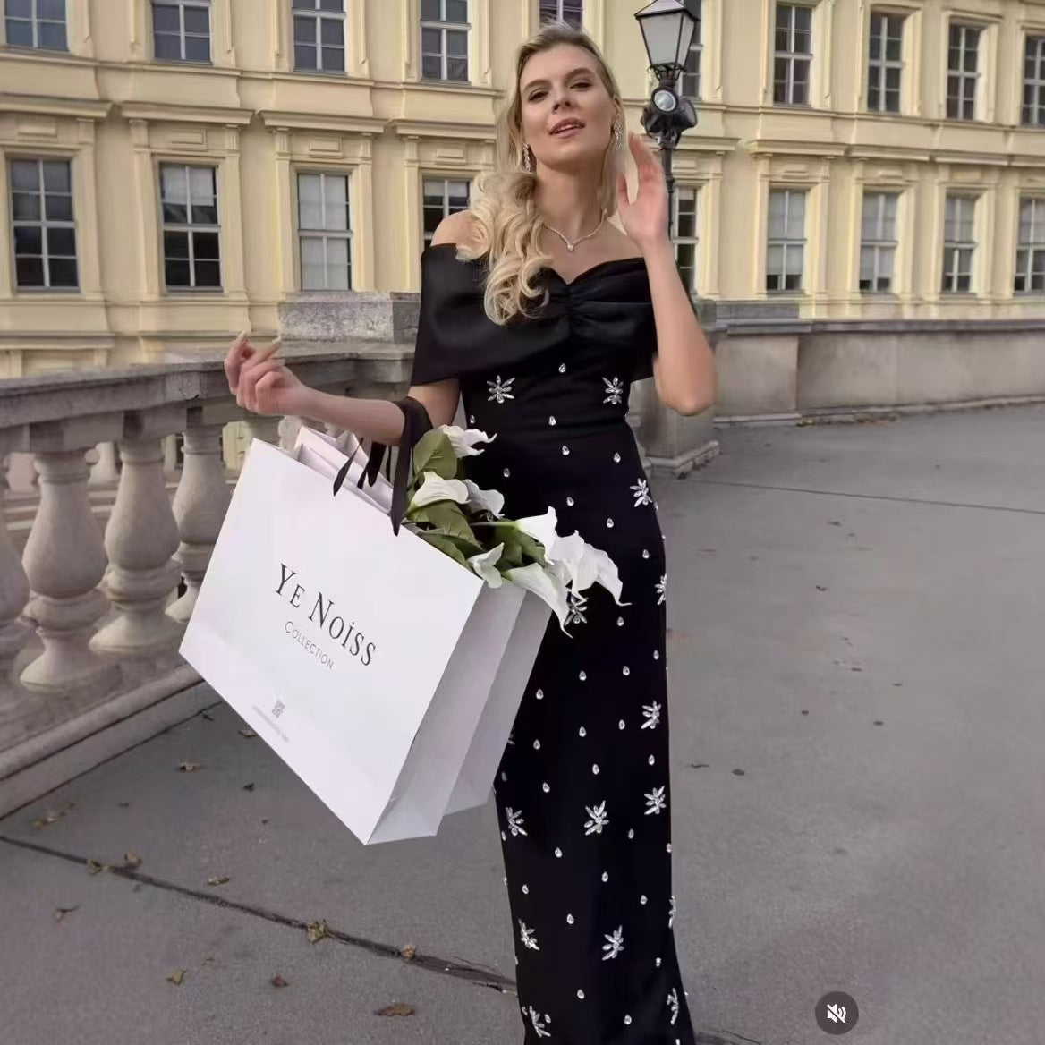 Ladies Elegant Evening Dress with Off-Shoulder Design and Sparkling Appliqués