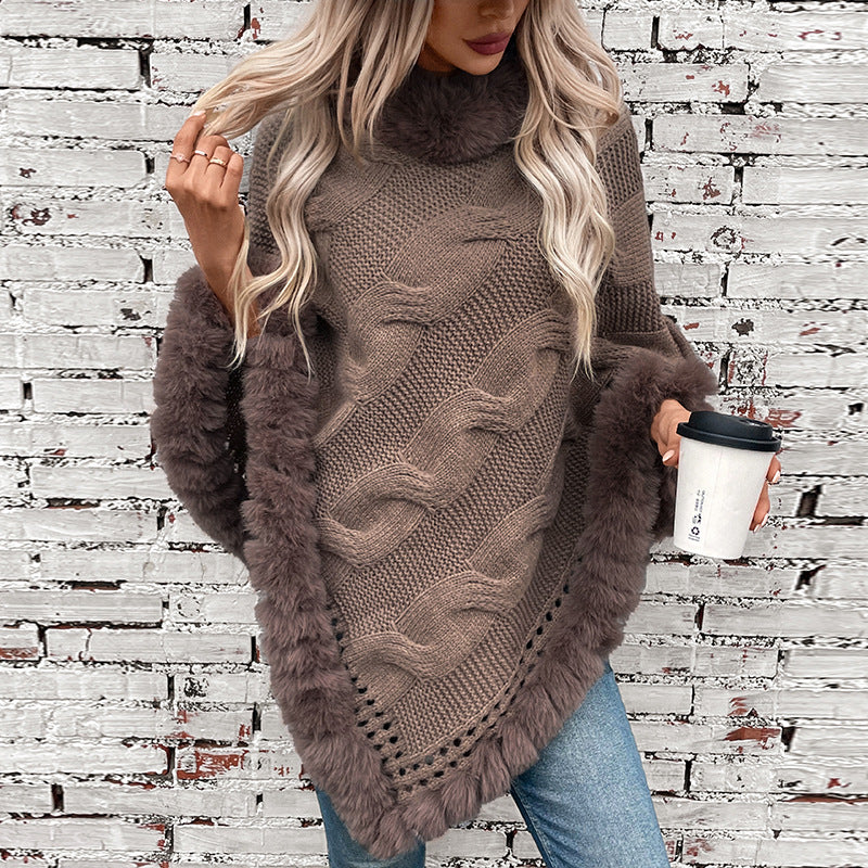 Women's cozy knit poncho with soft faux fur trim and cable knit pattern