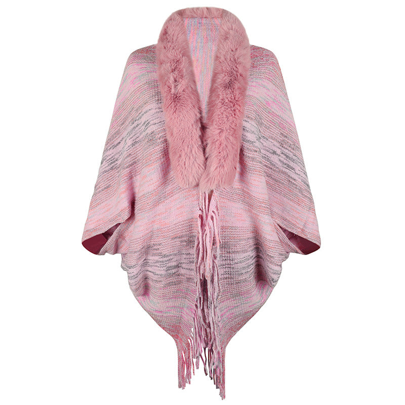 Women elegant poncho with luxurious faux fur collar and fringed hem