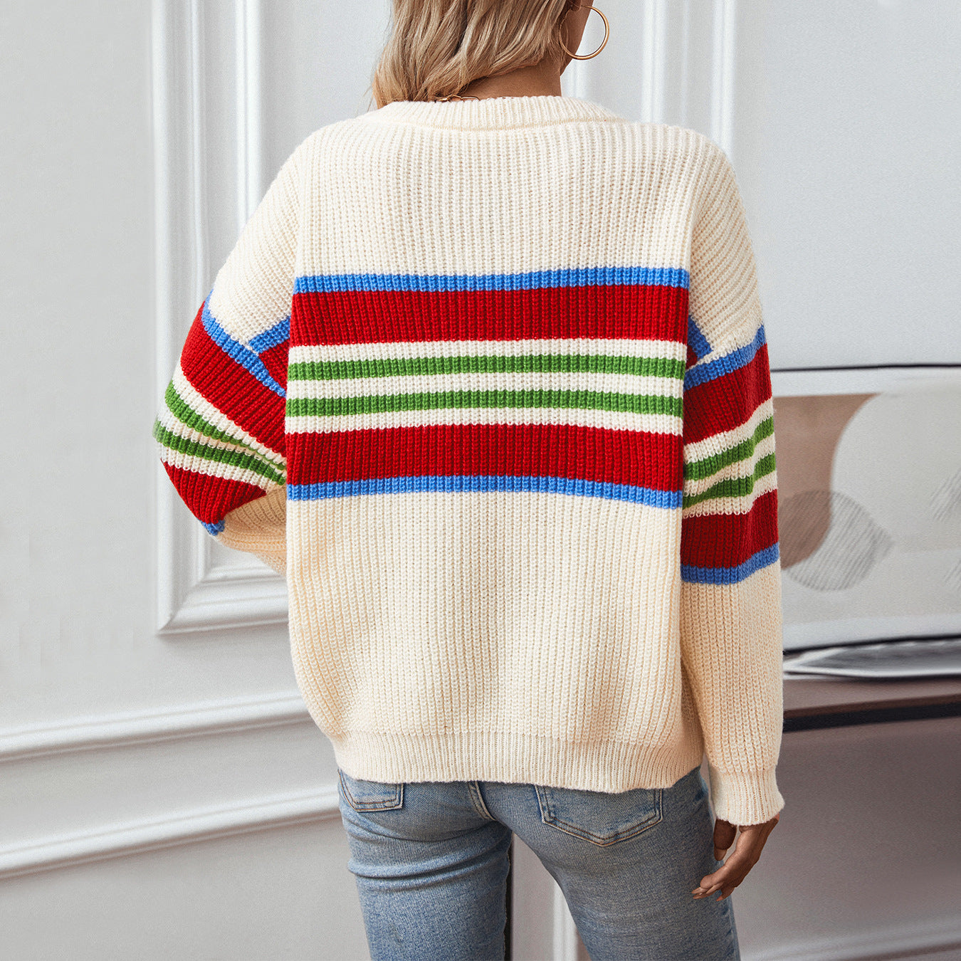 Ladies loose knit pullover with colorful block stripes and round neckline