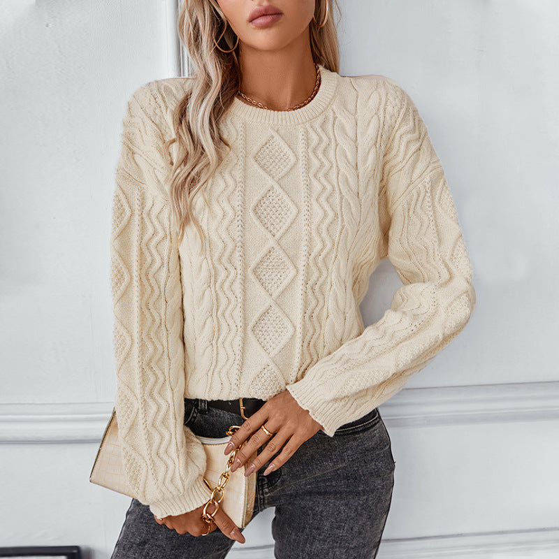 Women's chunky knit pullover with textured cable pattern