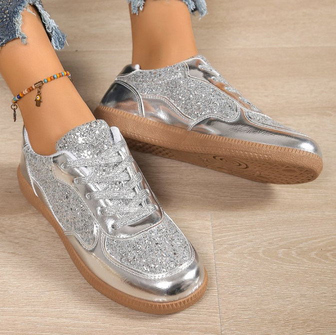 Ladies fashionable sneakers with shimmering upper material and non-slip sole