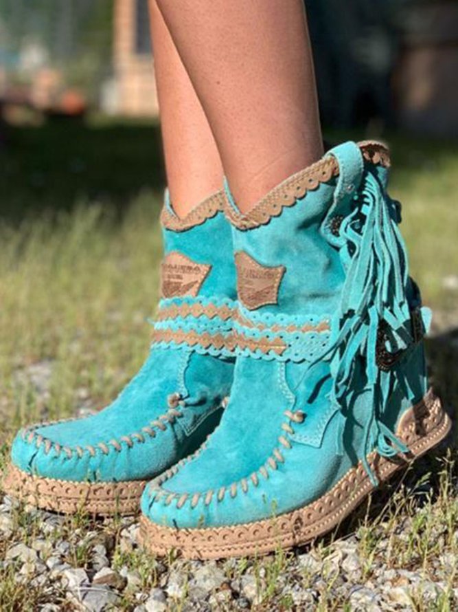 Western boots with fringes