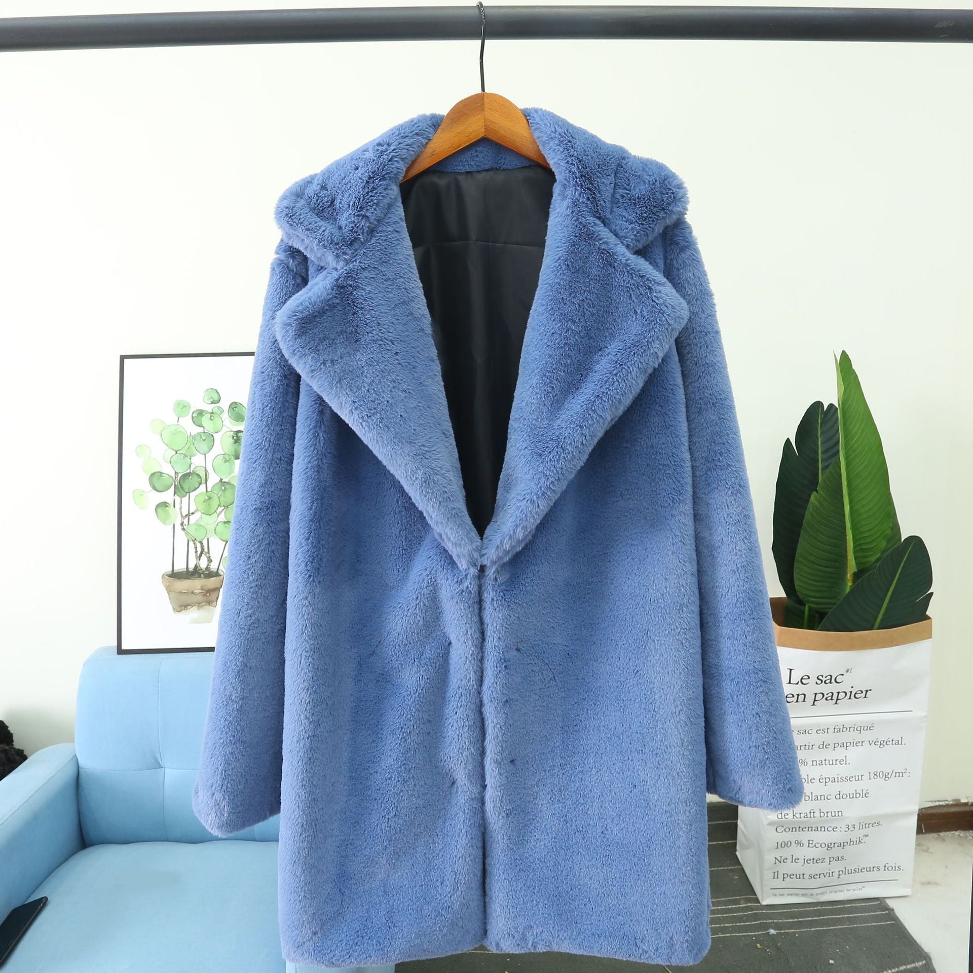 Ladies fluffy coat with lapels and comfortable fit
