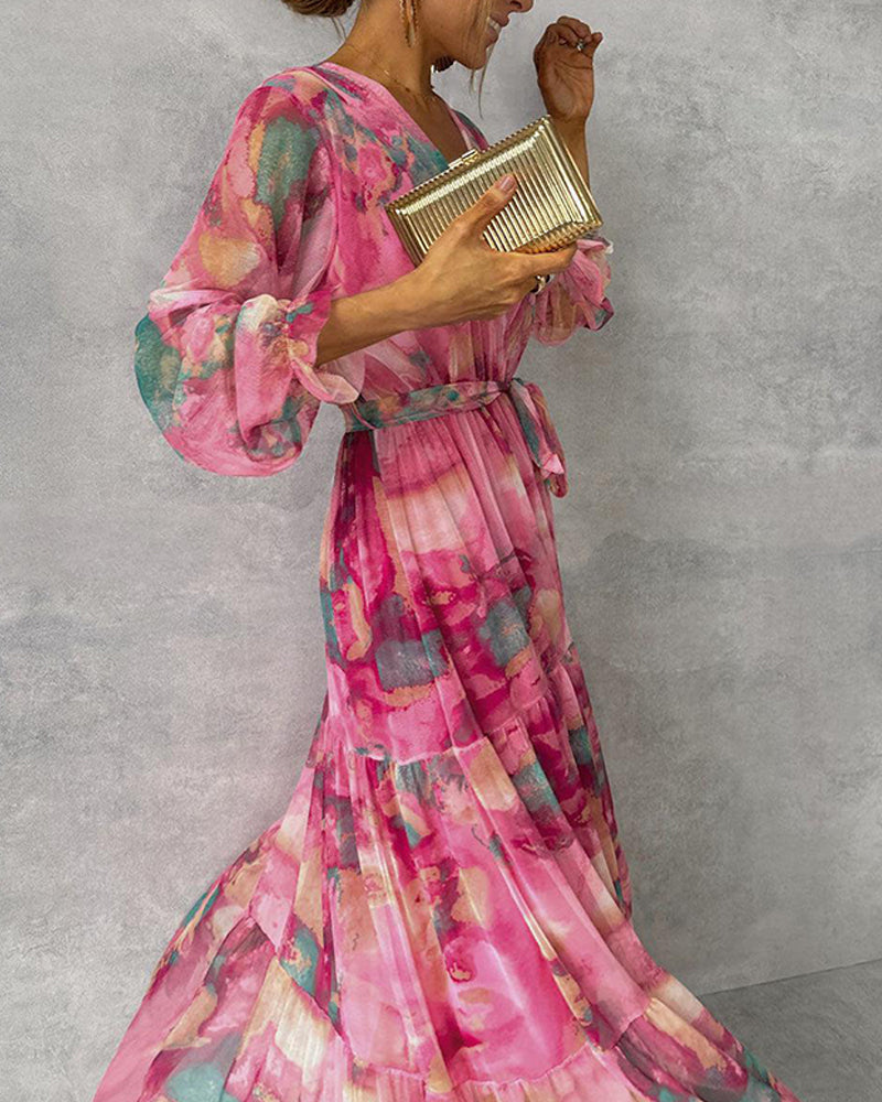 Elegant dress with print and pleated skirt