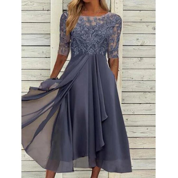 Women's elegant cocktail dress with floral lace top and flowing skirt