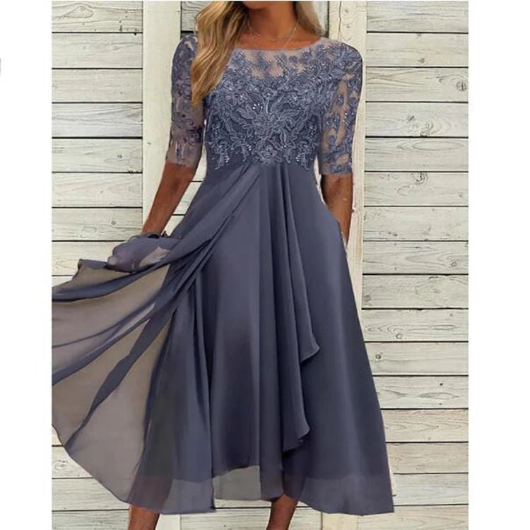 Women's elegant cocktail dress with floral lace top and flowing skirt