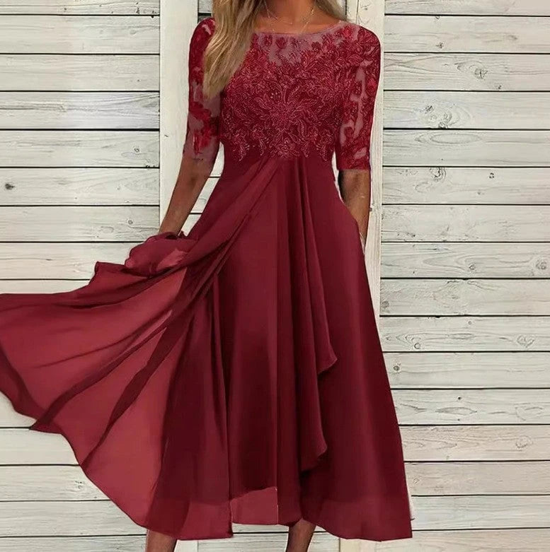 Women's elegant cocktail dress with floral lace top and flowing skirt