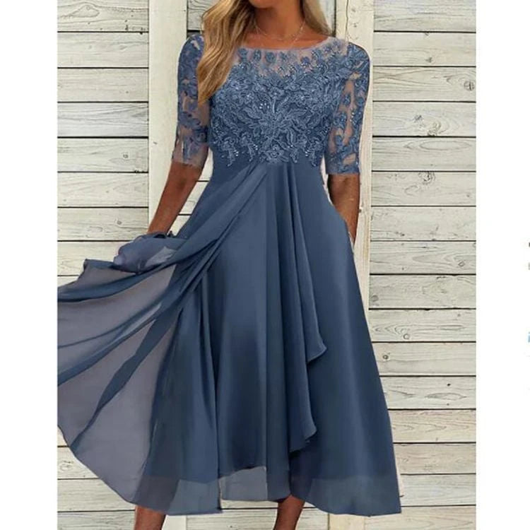 Women's elegant cocktail dress with floral lace top and flowing skirt