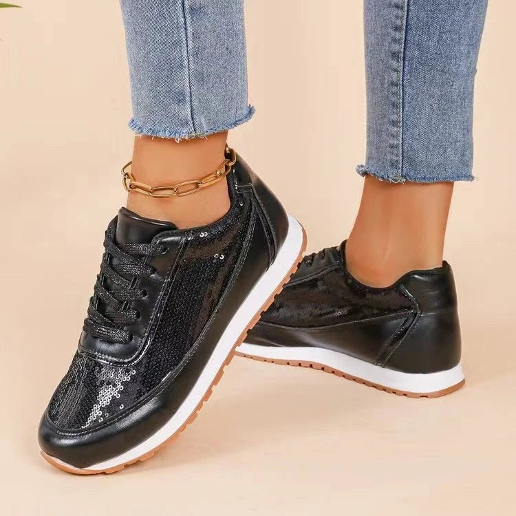 Ladies fashionable sneakers with shimmering upper material and non-slip sole