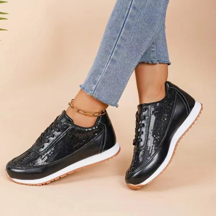 Ladies fashionable sneakers with shimmering upper material and non-slip sole