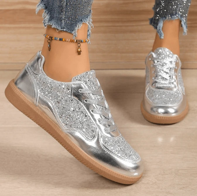Ladies fashionable sneakers with shimmering upper material and non-slip sole