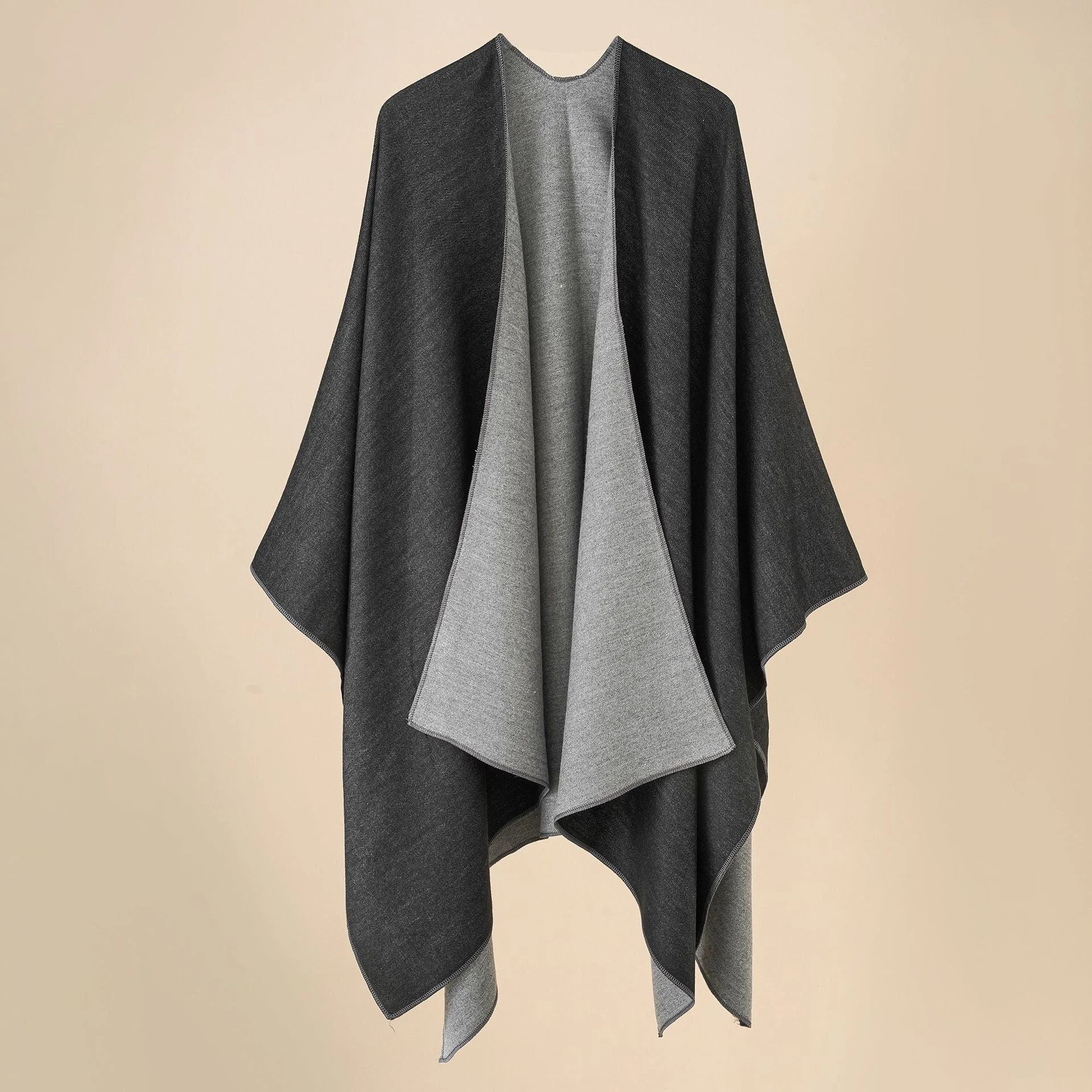 Women’s cozy poncho made of soft wool blend with elegant cut