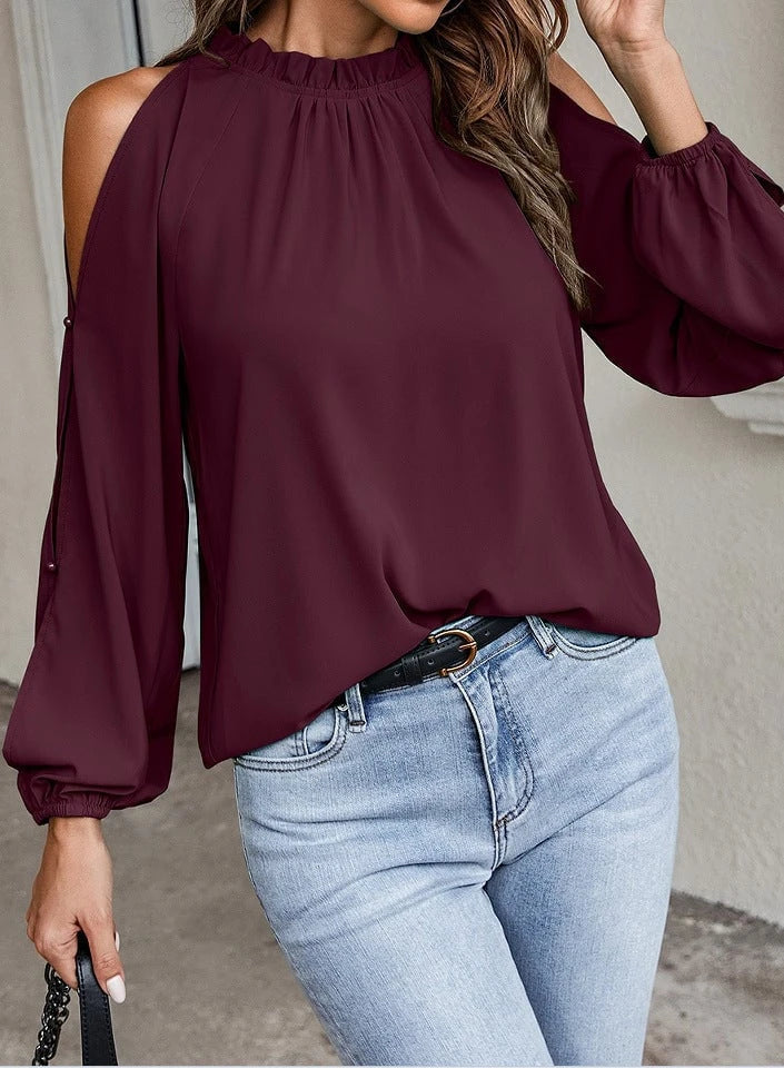 Ladies stylish top with off-the-shoulder inserts and elegant ruffle details