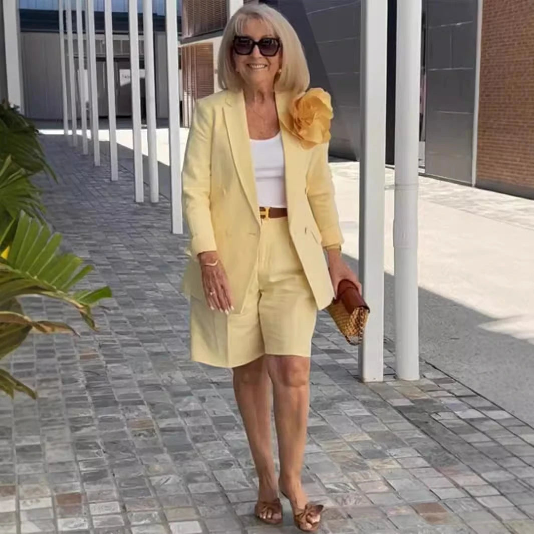 Women's elegant blazer shorts ensemble with stylish button detail and high-quality material