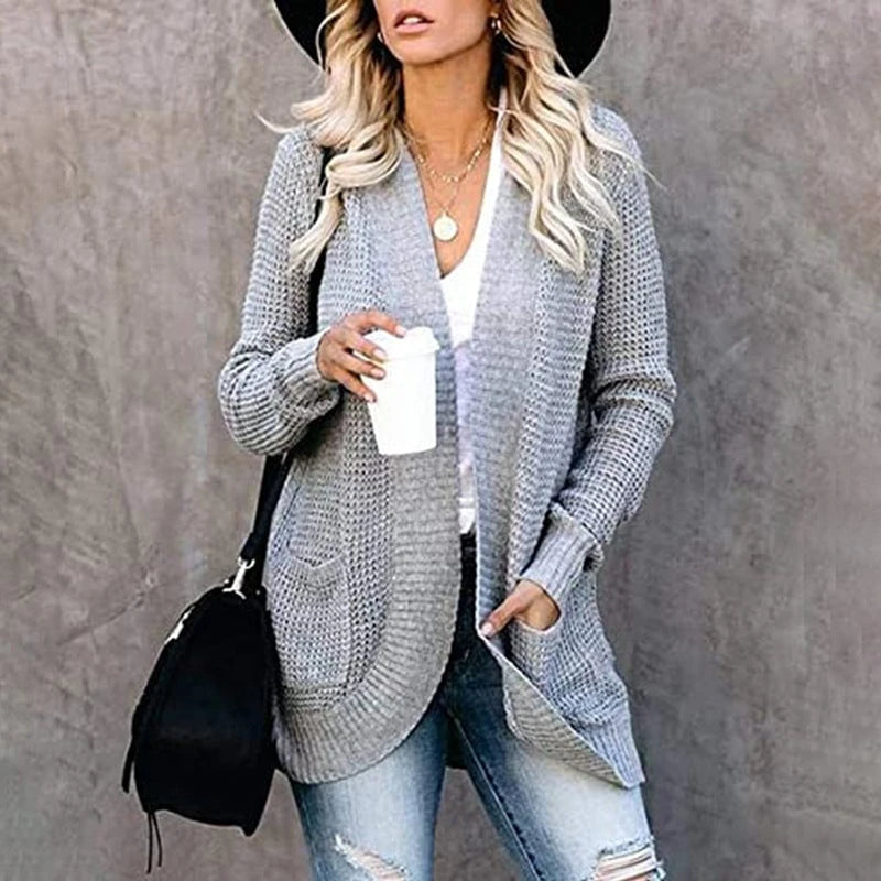 Women’s cardigan with open cut and side pockets
