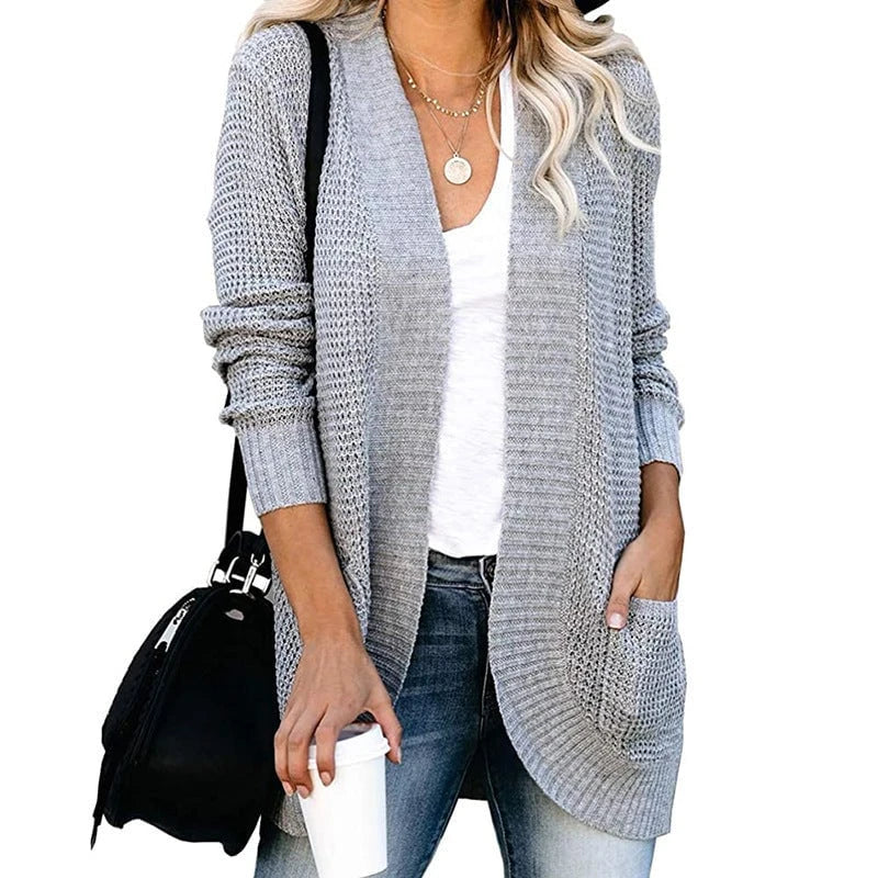Women’s cardigan with open cut and side pockets