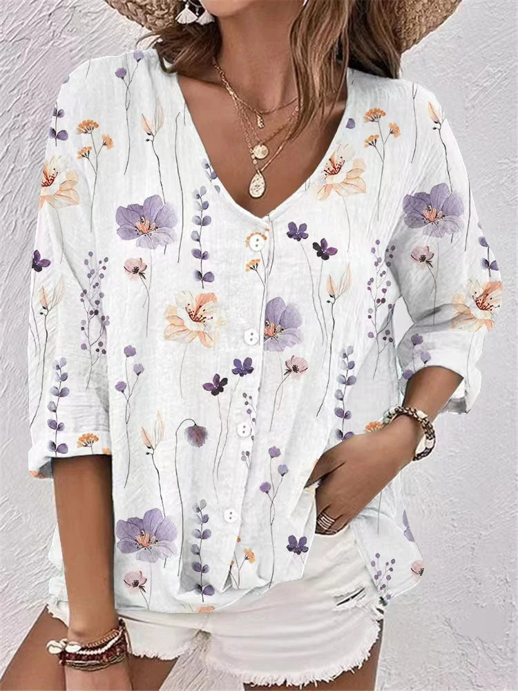 Women's blouse with floral print and modern button design