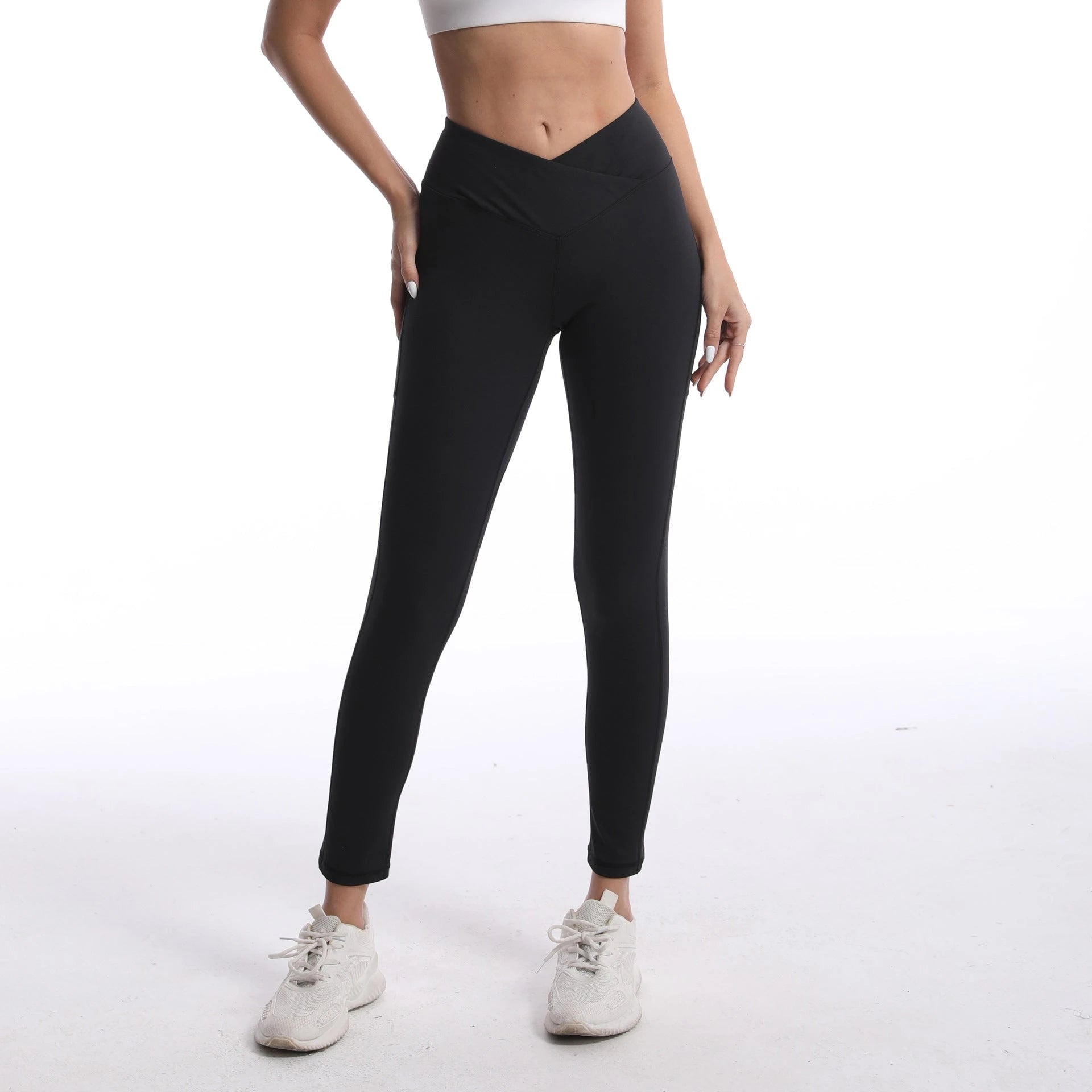 Women's figure-hugging sports leggings with high waistband and cross design