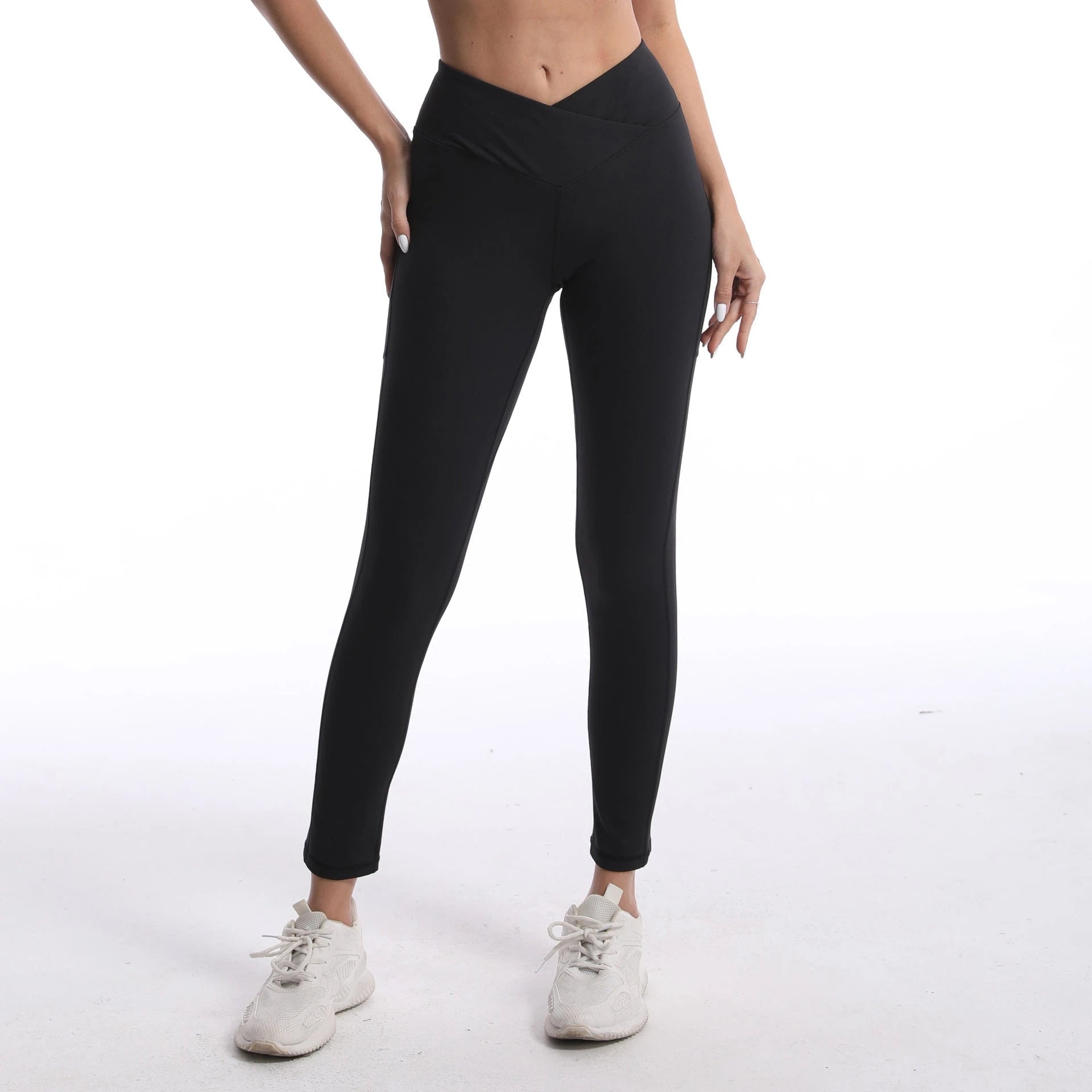 Women's figure-hugging sports leggings with high waistband and cross design