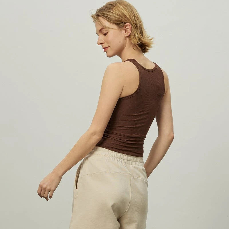 Women's form-fitting ribbed top with breathable mesh structure
