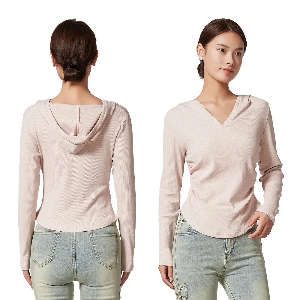 Ladies sporty top with hood and fitted cut