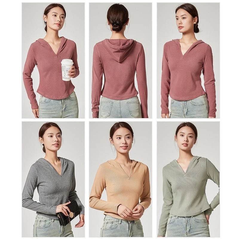 Women's hooded top with moisture-regulating technology and fashionable cut