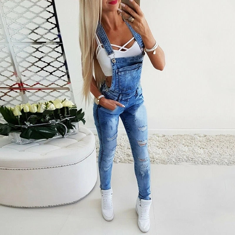 Ladies' jeans dungarees with fashionable destructions and adjustable straps