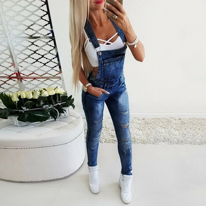 Ladies' jeans dungarees with fashionable destructions and adjustable straps
