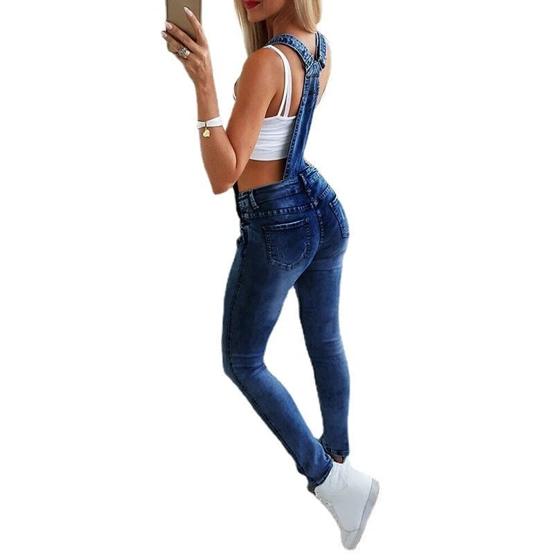 Ladies' jeans dungarees with fashionable destructions and adjustable straps