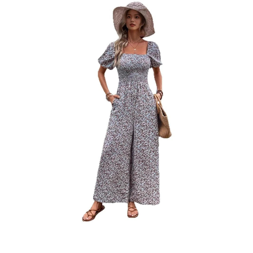 Women's floral patterned jumpsuit with puff sleeves and side pockets