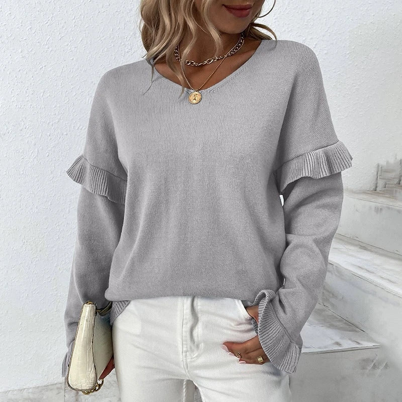 Ladies elegant pullover with ruffle details and V-neck